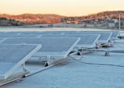 Photovoltaic-solar-panels-bitumen-flat-roof-Sweden-no-ballast