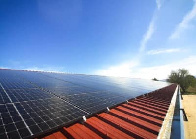 A farmer equips his roof with photovoltaic panels